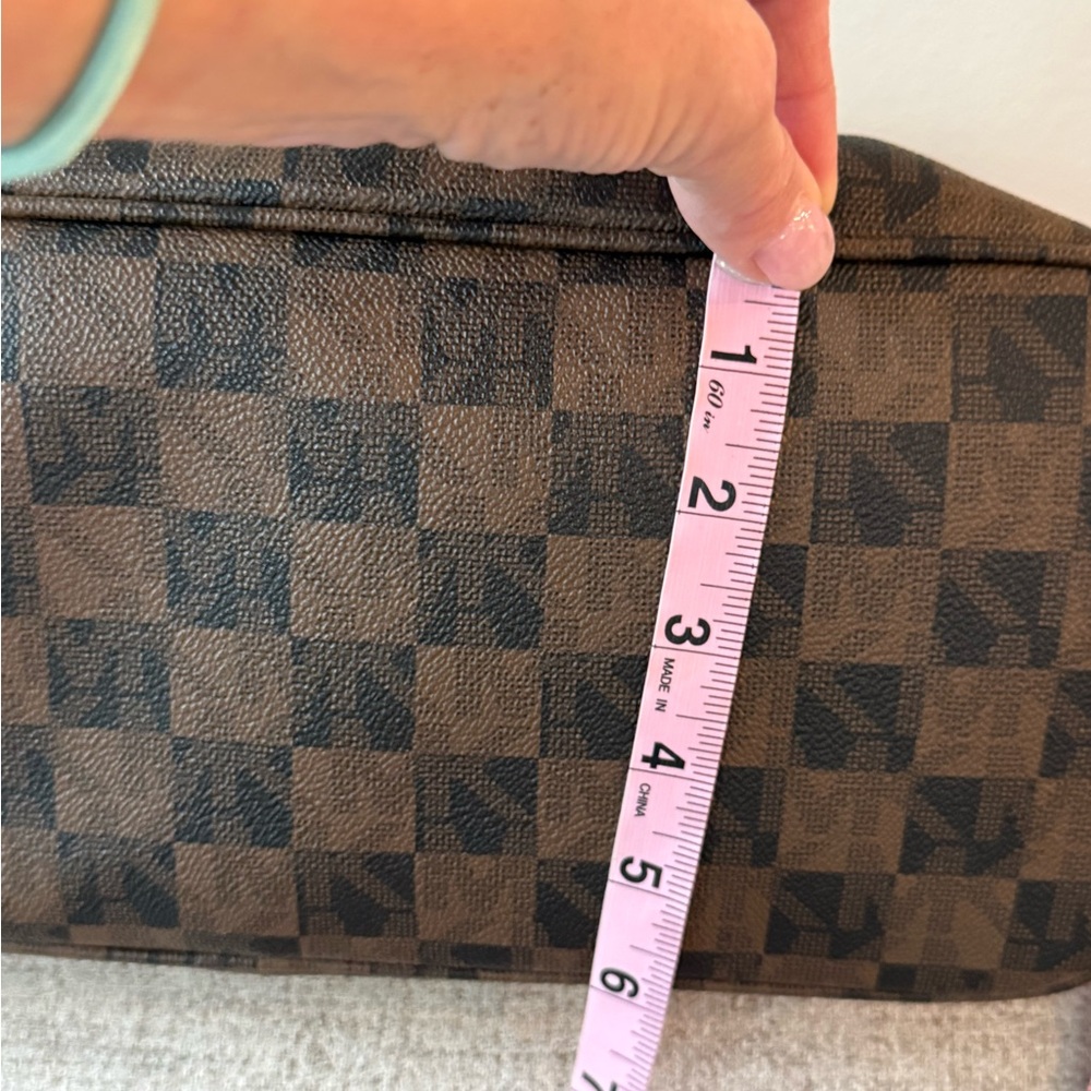 MICHAEL Michael Kors Jet Set travel tote in a brown checkered monogram pattern. - Picture 2 of 10